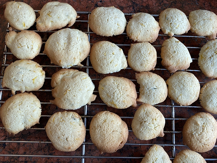Dandelion and lemon biscuits cooling on a wire rack