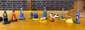 Painted nativity figures on the communion table
