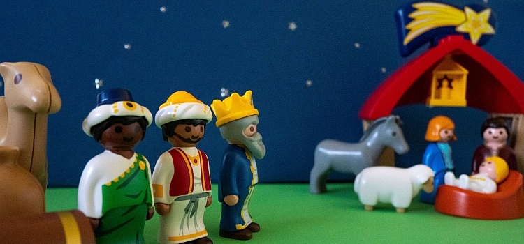 A Playmobil scene showing the three kings approaching the stable