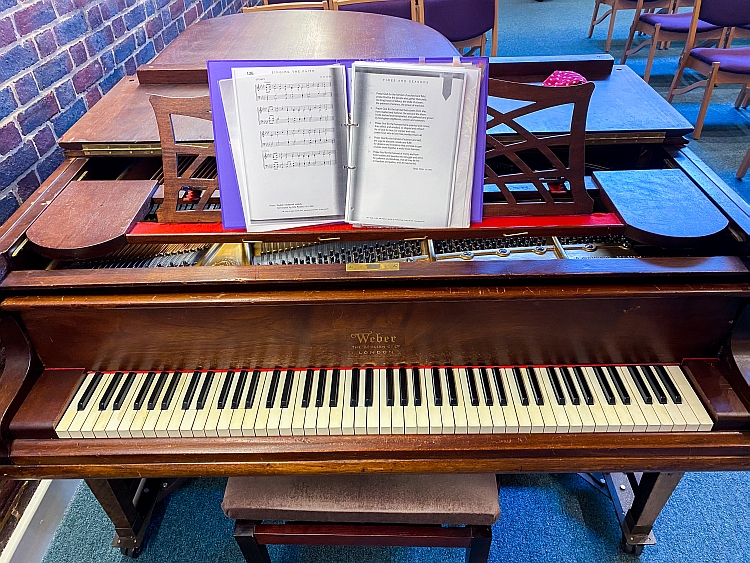 The grand piano in the chapel