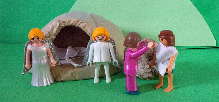 A Playmobil scene depicting Mary Magdalene recognising the risen Jesus outside the tomb
