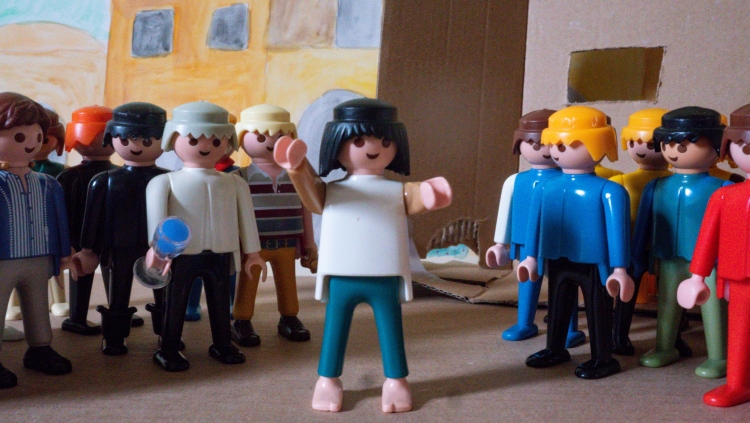 A Playmobil scene depicting Peter speaking to the crowd at Pentecost