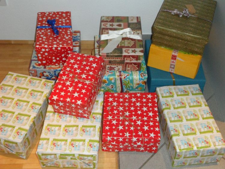Shoeboxes wrapped in Christmas paper