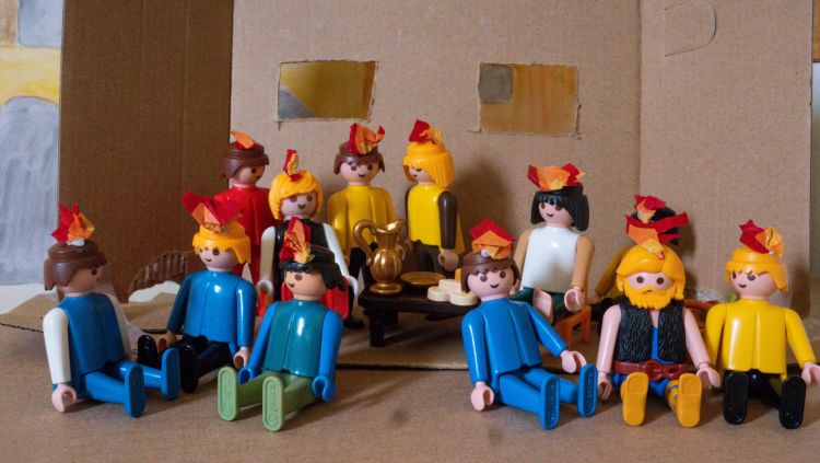 A Playmobil scene depicting tongues of fire resting on the disciples at Pentecost