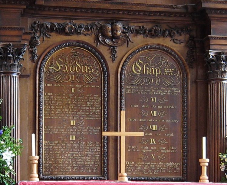 A decorative wall panel in a church showing the Ten Commandments