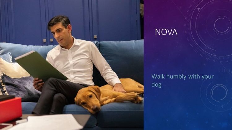 A slide showing an image of Rishi Sunak reading documents while stroking his dog and the text "Nova. Walk humbly with your dog."