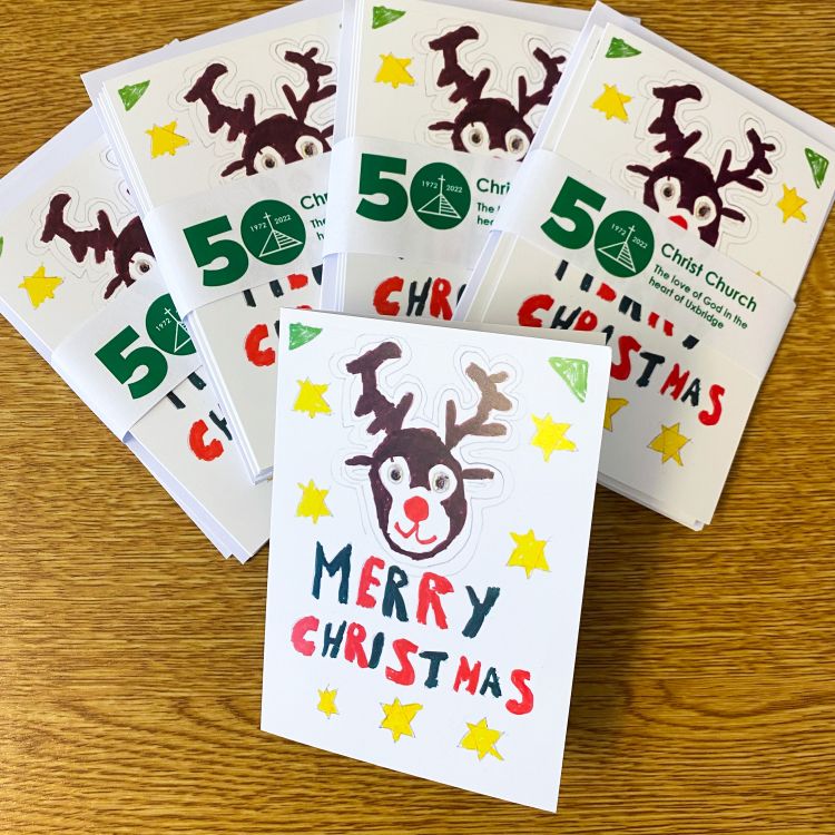 50th anniversary Christmas cards featuring a drawing of a reindeer and the words 'Merry Christmas'