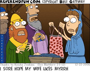 A cartoon of the three kings visiting Mary and Jesus, with Mary looking shocked and holding up a negligee with the kings also looking shocked. The caption reads "I sure hope my wife likes myrrh"