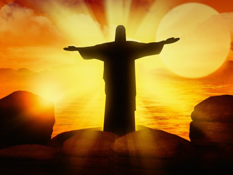An illustration of Jesus holding out his arms with a bright light shining behind him.