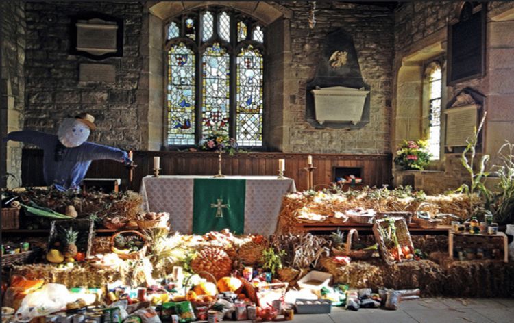 A church decorated with fruit and veg for harvest